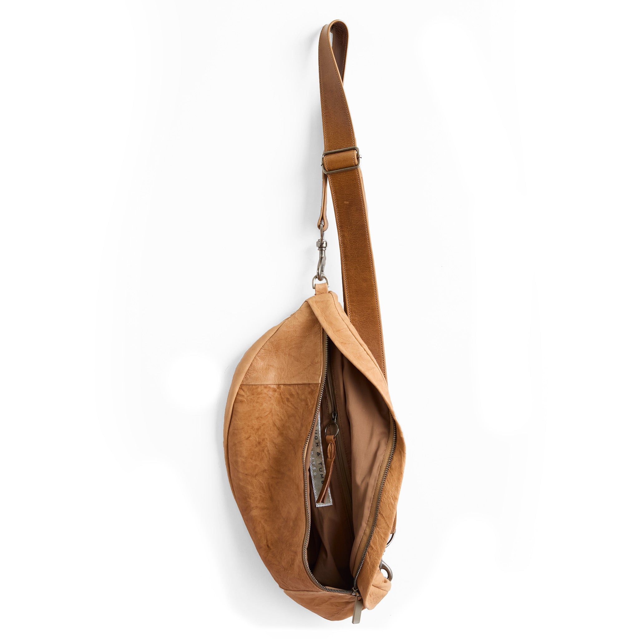 lissa in flight vachetta, showcasing interior nutmeg lining