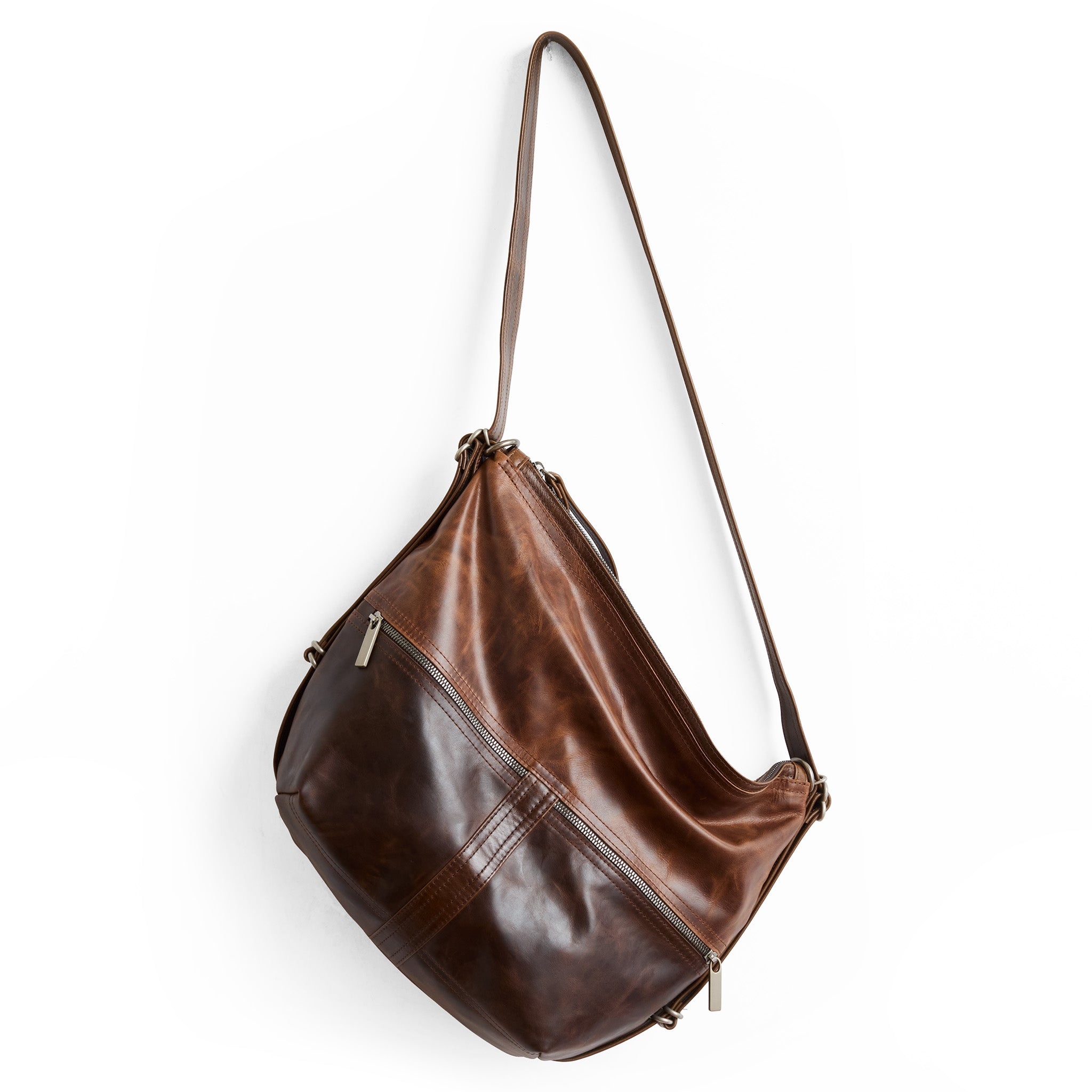 city safari double zip size medium in bourbon, on base, and selkie on top.