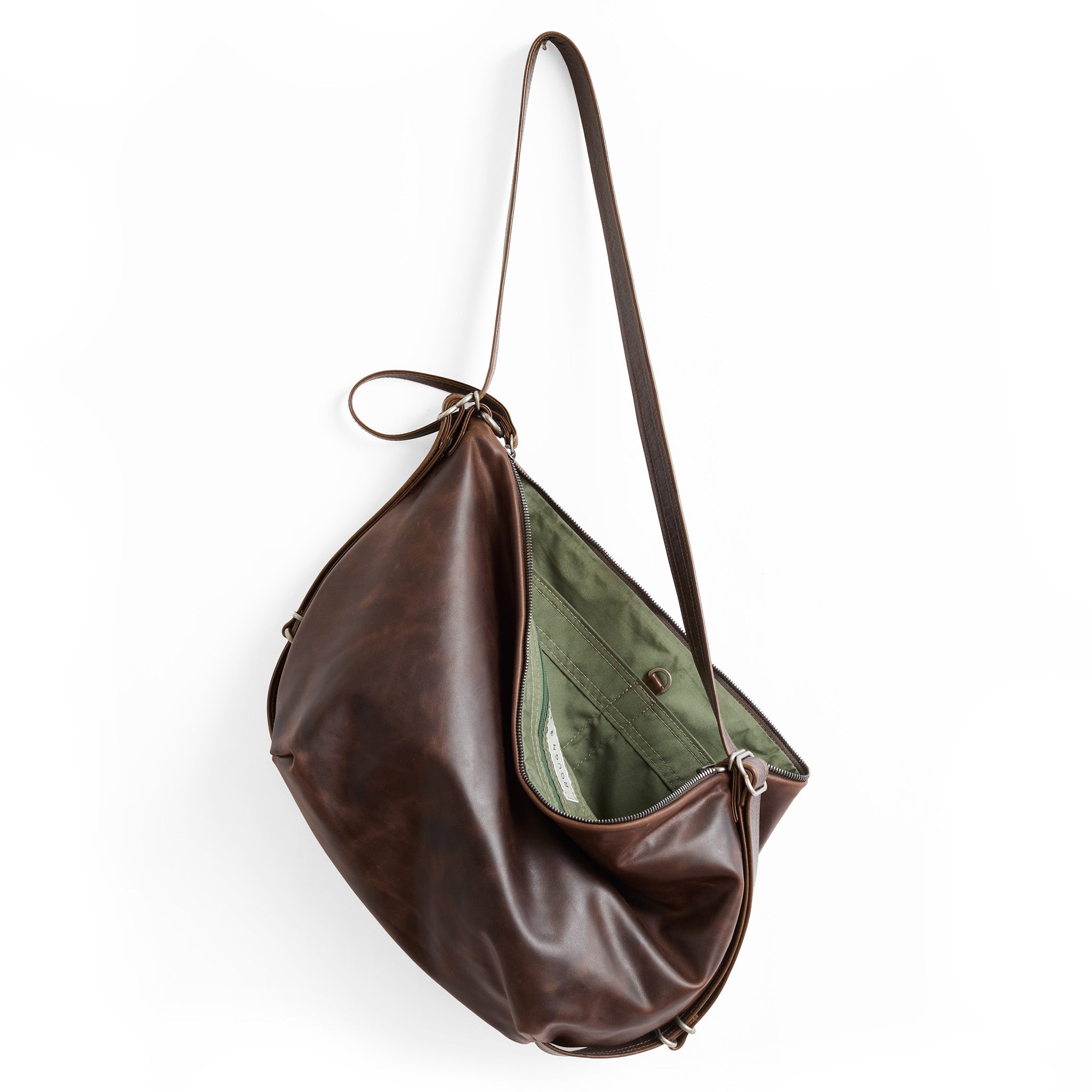 medium duffel in bourbon, showcasing interior acadia lining